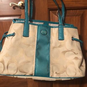 Turquoise coach purse